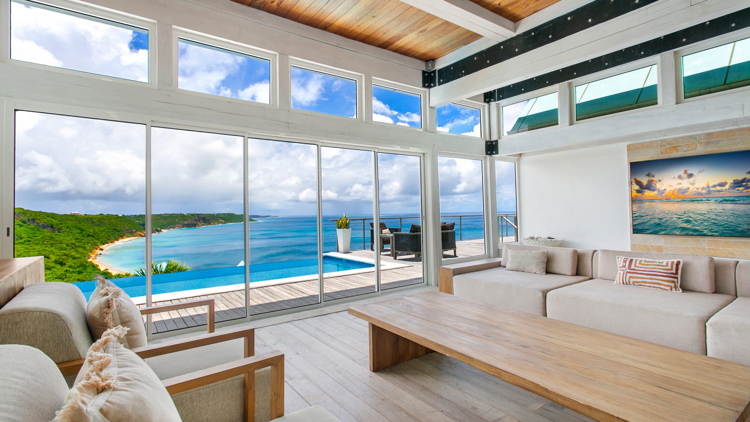 Luxury villa in Anguilla overlooking the Caribbean Sea, featuring elegant modern design and panoramic ocean views.