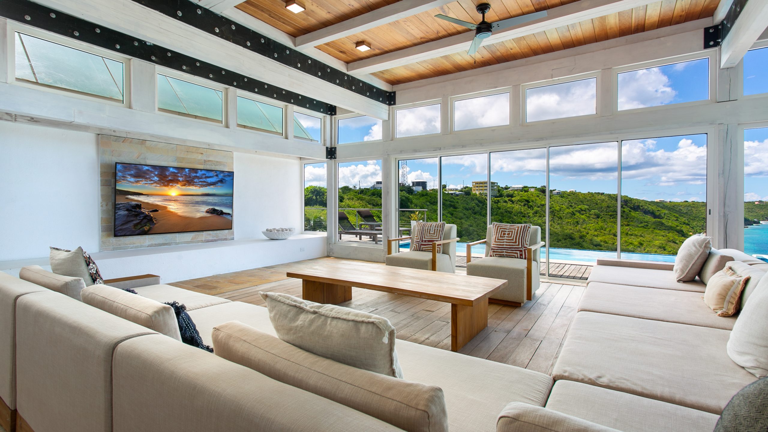 Luxury villa in Anguilla overlooking the Caribbean Sea, featuring elegant modern design and panoramic ocean views.