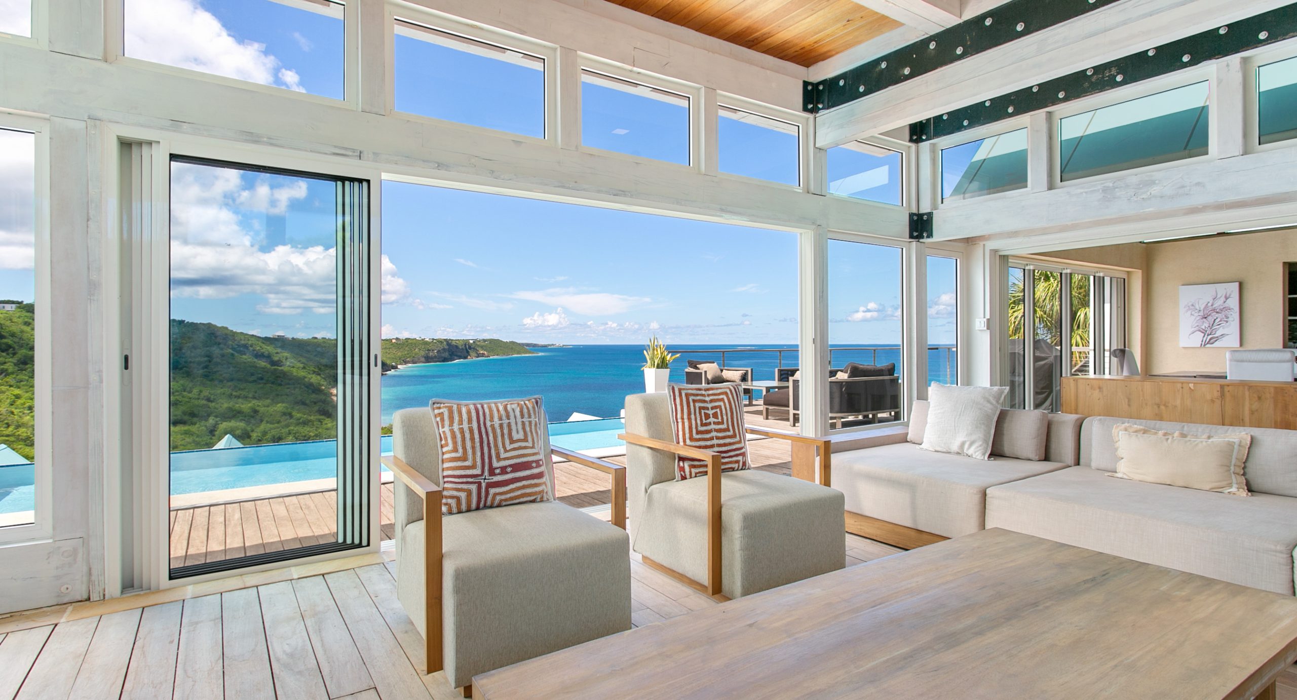 Luxury villa in Anguilla overlooking the Caribbean Sea, featuring elegant modern design and panoramic ocean views.