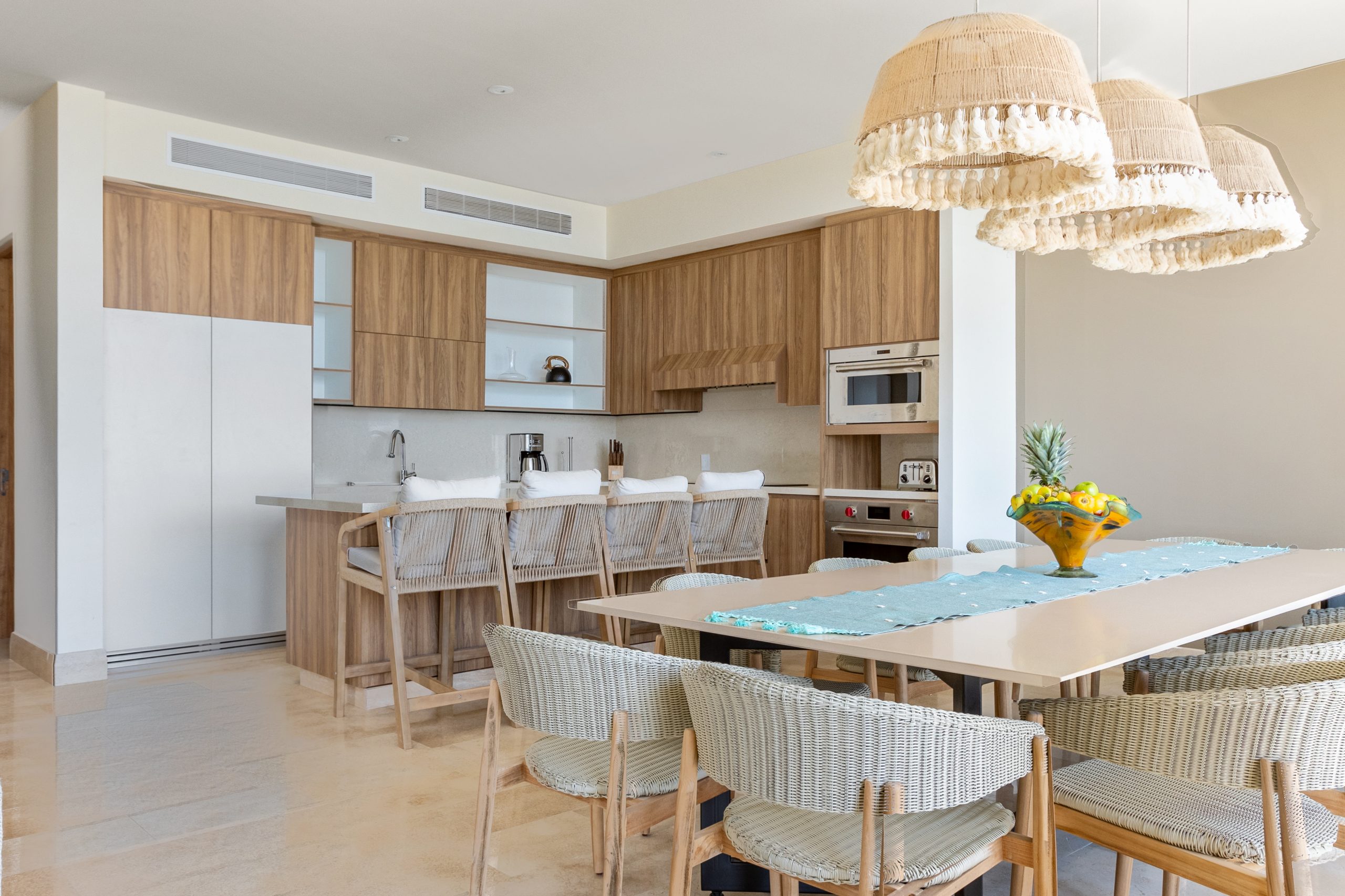 Modern luxury villa in Nuevo Vallarta, Mexico featuring contemporary architecture, private pool, and tropical garden views near the beach.