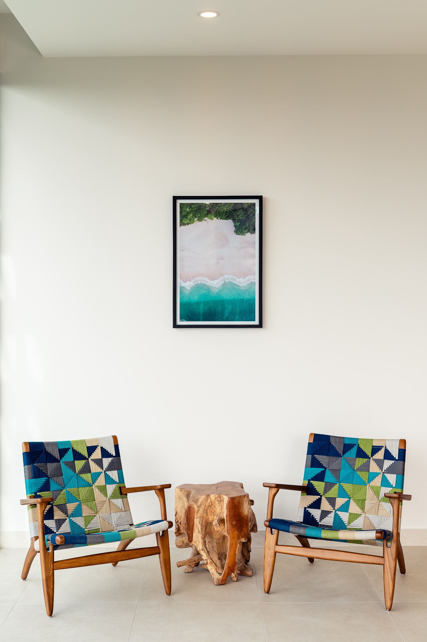 Elegant locally made chairs crafted in Costa Rica, featured in the dining area of the Reserva Conchal penthouse, blending contemporary design with artisanal craftsmanship.