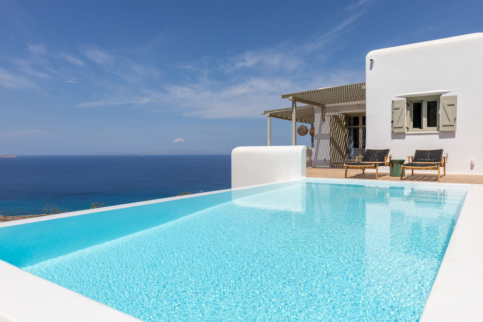 Private pool at a luxury villa in Mykonos with a stunning view of the agean sea